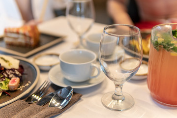 Desk mug white glass transparent white background food servirovka white tablecloth