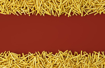 Fried potato chips arranged in stripes on red background. Top view of french fries. Flat lay fast food concept.