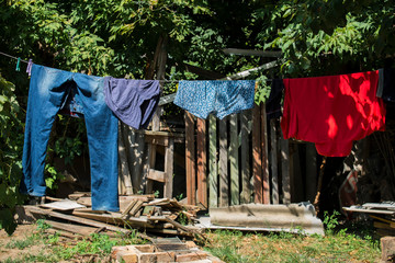 Things after washing dry on a rope in the village