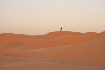 Fototapeta na wymiar man in desert