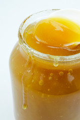 jar of orange sweet honey