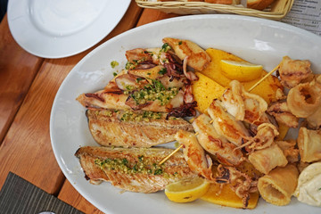 Grilled fish and seafood platter in the restaurant. Piran, Slovenia