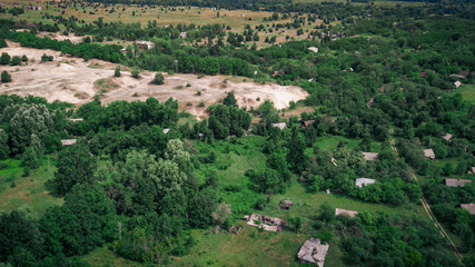 Aerial view abandoned village in the resettlement zone in the Polessky Radiological Reserve. Ecological problem concept.
