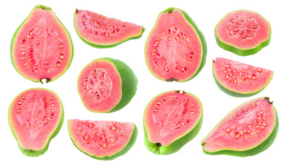 Isolated guava pieces. Collection of cut green pink fleshed guava fruits of different shapes...