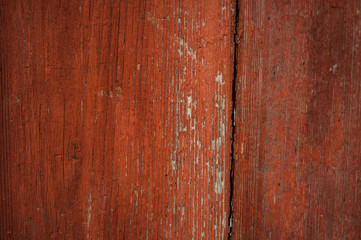 Naklejka premium wooden polished red door background