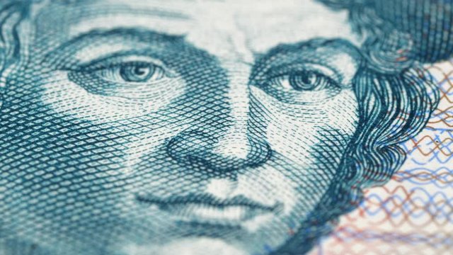 Christopher Columbus portrait on Salvador 5 colones (1997) rotating. Low angle, macro. 4K, 422 10 bit