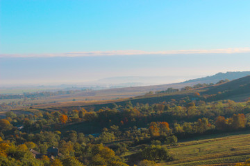 Fototapeta premium A view at a small mountain valley on a nice sunny day.