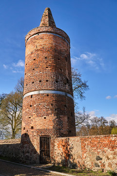 Medieval defensive walls with a tower in the city of Osno in Poland..