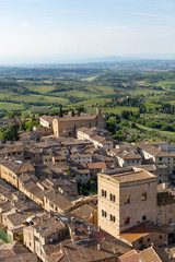 Fototapeta na wymiar Tuscany, Iltaly - May 28, 2015:.View from a tower over San Gimignano