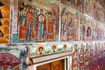 Mount Athos, Greece. 2011/7/27. Walls covered in Byzantine icons. The Holy and Great Monastery of Vatopedi – an Eastern Orthodox monastery on Mount Athos, Greece. - obrazy, fototapety, plakaty