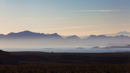 A hazy sunrise over the Lake Mead National Recreation Area in Boulder City, Nevada