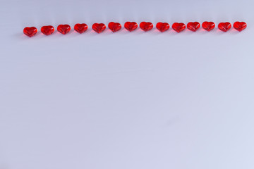 Small red hearts in line white background valentine