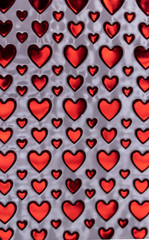 Fototapeta na wymiar Red shiny heart pattern valentine