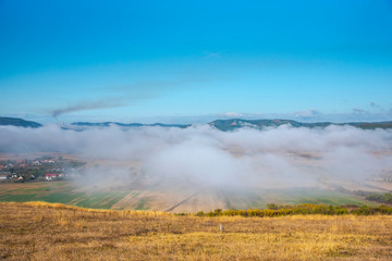 Morning fog on the hill
