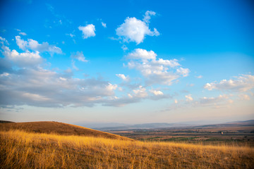 Fototapeta premium Landscape on the hill at the sunset