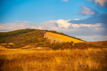 Obraz premium Landscape on the hill at the sunset