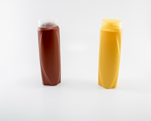 Shampoo bottles photographed on white background. Photographed in a studio setting.