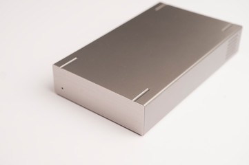 metallic gray hard drive, on white background