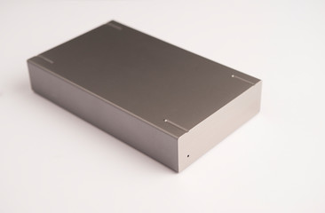 metallic gray hard drive, on white background