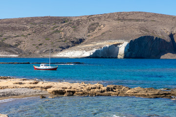 Mountains and boat in Pollonia beach