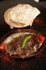 Turkish Doner Kebab with rice and pita on the dinner plate