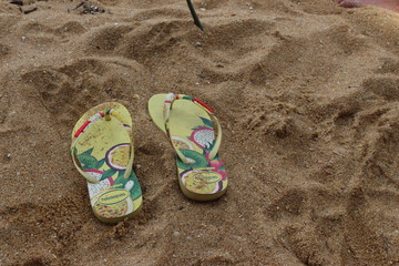 Paraty/Rio de Janeiro/Brazil - 01-18-2020 - Prainha beach near Paraty. Flip flop on the sand. It's a good place to relax, to rest and have fun with family and friends. South America Beach