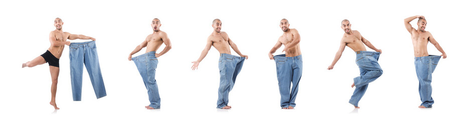 Fototapeta na wymiar Man in dieting concept with oversized jeans
