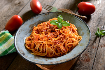 Tasty spaghetti pasta with tomato sauce