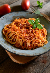 Tasty spaghetti pasta with tomato sauce