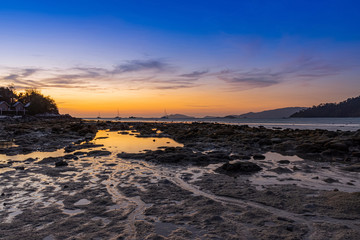 Sea level drop in the evening at sunset beach, Lipe Island, Thailand