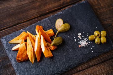 Traditional Caucasian smoked Chechel cheese. Beer snack, tasty food