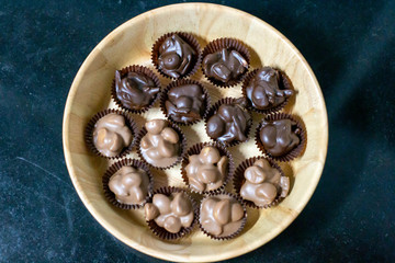  chocolate  praline  with mixed nut background