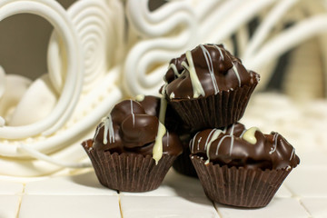  chocolate  praline  with mixed nut background