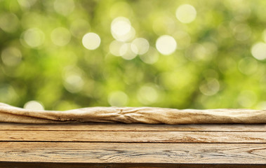 Spring green background wooden table