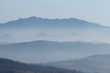 mountains in the fog
