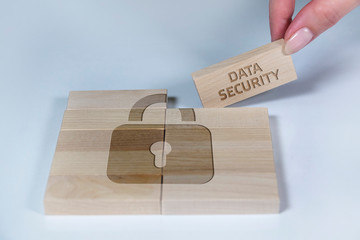 Business, Technology, Internet and network concept. Young businessman shows the word:Data security