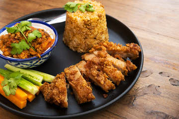 Fried rice with chili paste and Thai fried pork