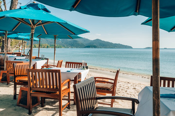 Romantic outdoor beach cafe on the tropical island in Thailand