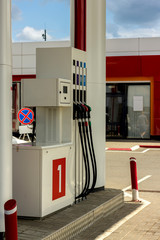 car refueling, gas station with refueling guns