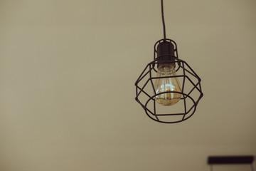 Fototapeta na wymiar Edison's light bulb and lamp in modern style