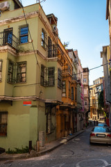 Fototapeta na wymiar Istanbul, Turkey. July 21, 2019. Fatih historic district, Balat quarter, view of the street and houses