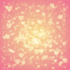 Heart bokeh texture/background/pattern to celebrate Valentine Day. Yellow and pink gradient design. Pastel colors. Falling snow effect. Heart snowflakes.