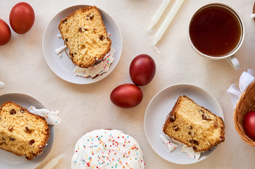 Table with easter cake and brown colored eggs
