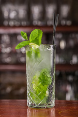mojito cocktail on a wooden stand
