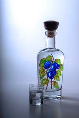 A plum brandy in a hand-painted bottle. National drink in Eastern Europe.