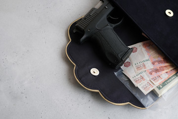 Fototapeta premium Top Secret File with money, picture and gun