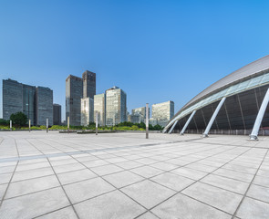 Fototapeta premium Empty city square road and modern business district office buildings in Beijing, China