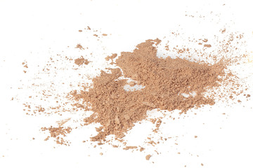 Loose powder for the face isolated on a white background.