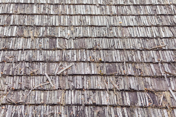 old weathered wooden gray shingle.