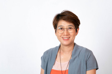 The image of a short-haired Asian woman smiling, wearing glasses on a white background.